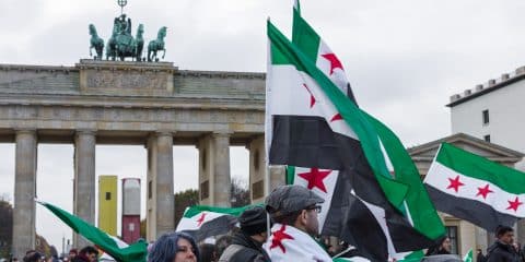 BERLIN - NOVEMBER 12 2017: Protest action of the Syrian opposition near Brandenburg Gate against the Russian Army in Syria.