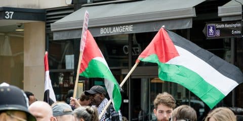 London, United Kingdom, 14th April 2018:- Protesters gather along Kensington High Street, near the Israeli Embassy in London to protest the ongoing occupation of Palestine.