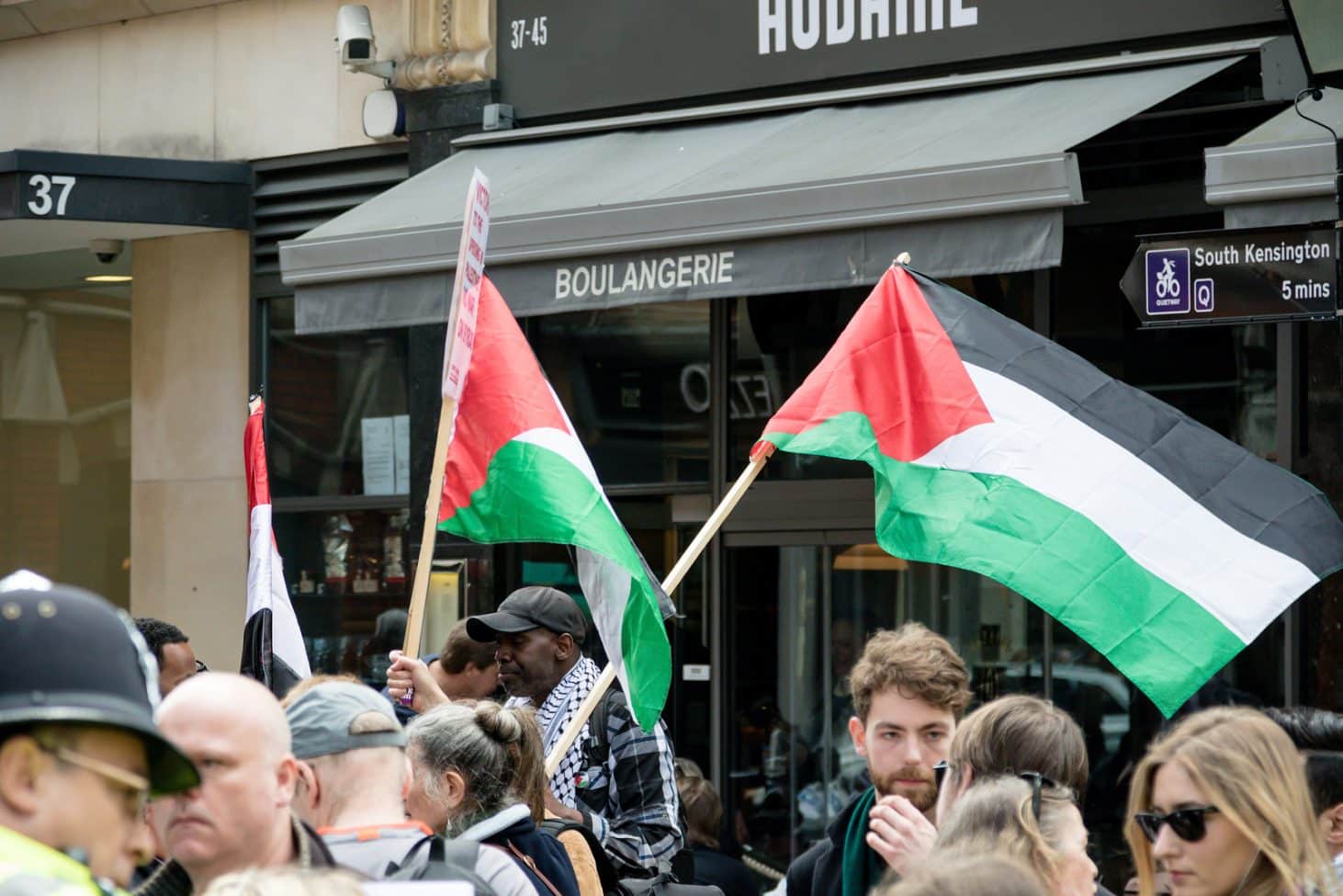 London, United Kingdom, 14th April 2018:- Protesters gather along Kensington High Street, near the Israeli Embassy in London to protest the ongoing occupation of Palestine.