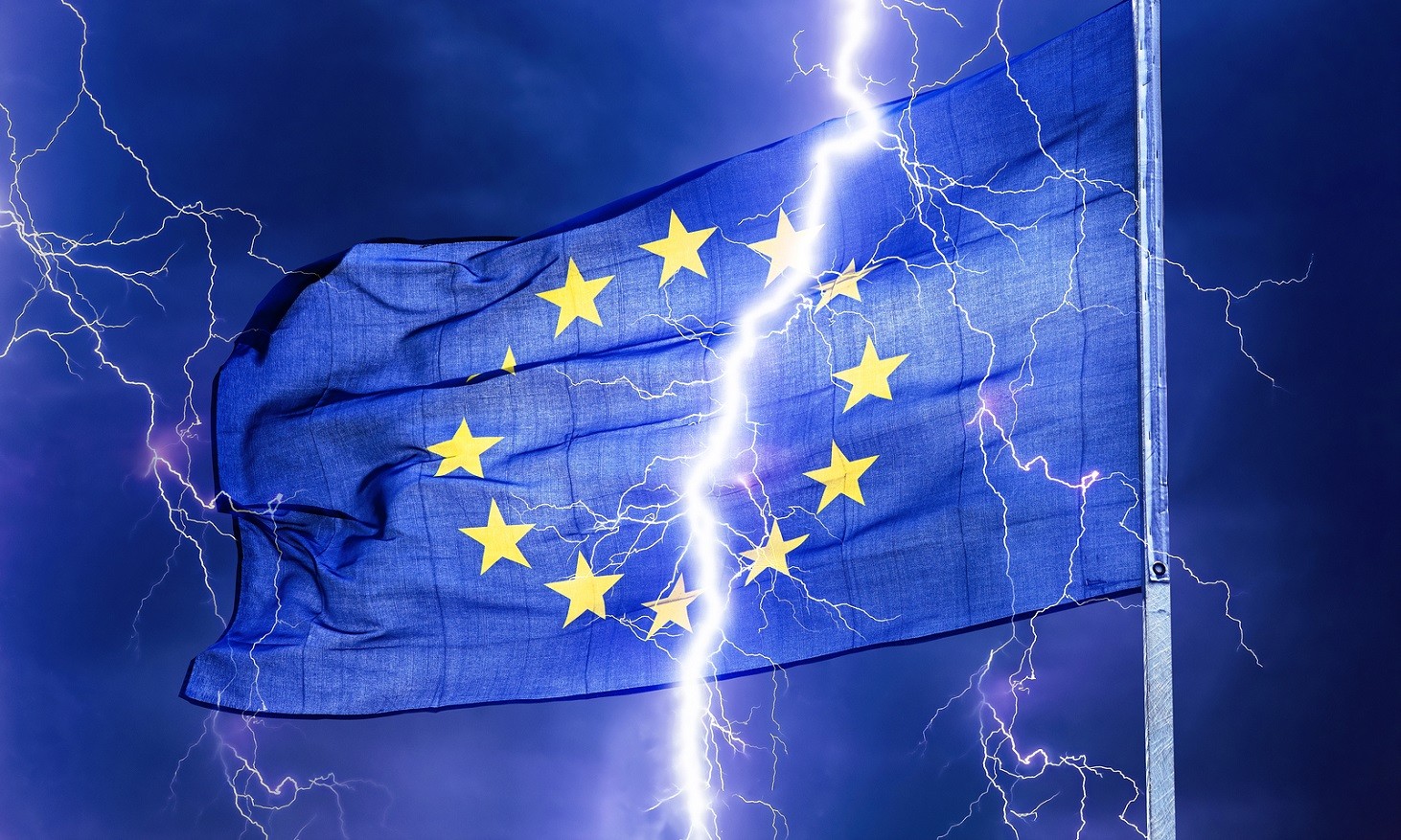 A flash of lightning seems to split an European flag into two parts.