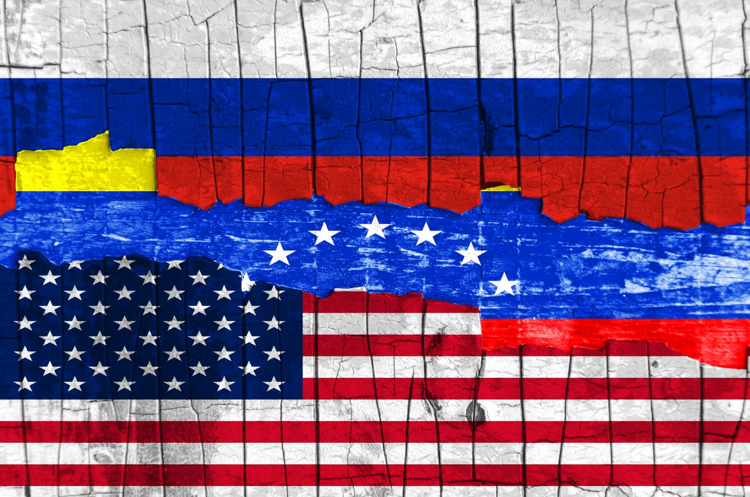 Flags of Venezuela, Russia and the USA on the background texture peeling paint with a crack. Horizontal frame