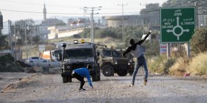 May 7, 2022, Jenin, West Bank, Palestine: Palestinians throw stones at the Israeli army