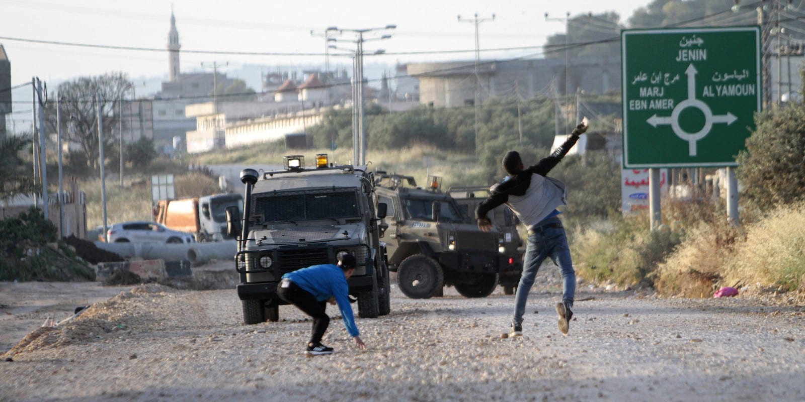 May 7, 2022, Jenin, West Bank, Palestine: Palestinians throw stones at the Israeli army