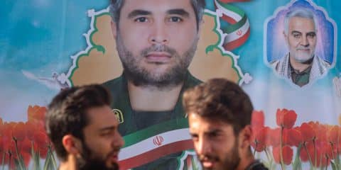 University students stand under a portraits of the assassinated Islamic Revolutionary Guard Corps™ Commander, Colonel Sayyad Khodai, and the former Commander of IRGC™s Quds Force, General Qasem Soleimani