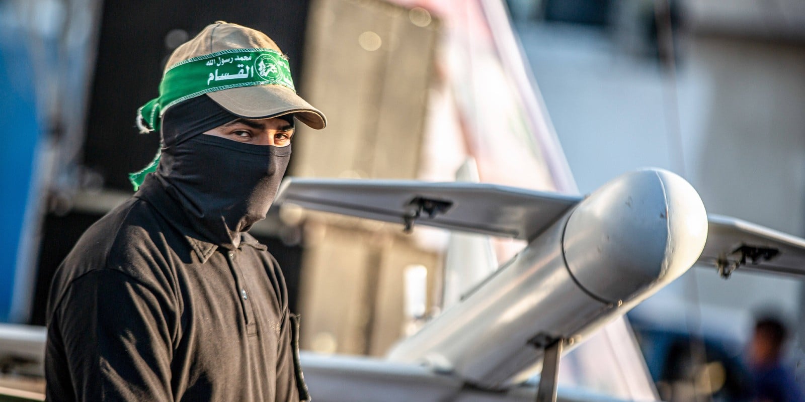 A member of the Izz al-Din al-Qassam Brigades, the armed wing of the Hamas, parades their homemade drones in Khan Yunis.