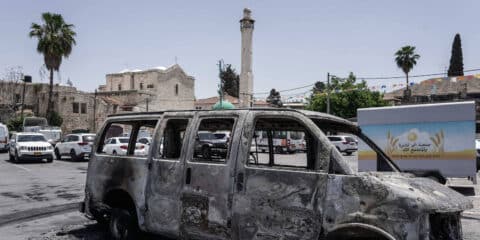 May 12, 2021, Lod, Israel Debris and torched vehicles litter the streets of the mixed Jewish Arab city