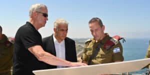 Lebanese Border, Israel: Israeli Prime Minister YAIR LAPID (C) and Defense Minister BENNY GANTZ (L) tour the IDF Northern Command near the Lebanese border and hold an operational assessment with Commander of the IDF Northern Command Maj.-Gen. AMIR BARAM (R).