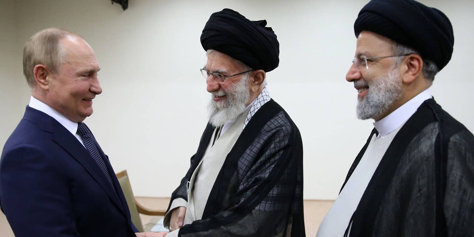 Iranian Supreme Leader Ayatollah ALI KHAMENEI s office shows him (C) receiving Russian President VLADIMIR PUTIN in the presence of his Iranian counterpart Ebrahim Raisi in Tehran, on July 19, 2022