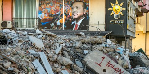 A photo of Turkish President Erdogan is displayed in a window of the AK party headquarters in Kahramanmarash