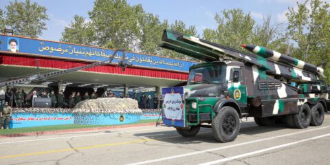 A missile is carried on a truck during the Army Day parade at a military base in northern Tehran.
