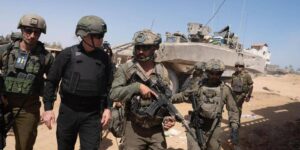 sraeli Minister of Defense YOAV GALLANT (black) visits troops in Rafah