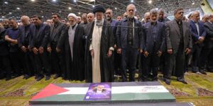 August 1, 2024, Tehran, Iran: Iranian Supreme Leader Ayatollah ALI KHAMENEI (C), Iranian President MASOUD PEZESHKIAN (C-R), and other officials praying over the coffins of Hamas Political leader Ismail Haniyeh and his bodyguard