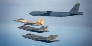 Israeli F-35i and F-15i fighter jets fly alongside a U.S. B-52 strategic bomber
