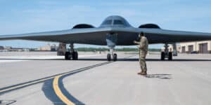 May 9, 2025, Knob Noster, Mo, United States: A U.S. Air Force airman assigned to the 393rd Bomber Generation Squadron, signals to a B-2 Spirit stealth strategic bomber, assigned to the 509th Bomb Wing, as it taxis at Whiteman Air Force Base, May 9, 2025 in Knob Noster, Missouri. Knob Noster United States - ZUMAp138 20250509_zaa_p138_095