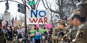 February 28, 2026, Washington Dc, Washington Dc, USA: National Guard members watch as people protest near the White House against U.S. and Israeli strikes on Iran, Saturday, Feb. 28, 2026 in Washington. Ayatollah Ali Khamenei, the supreme leader of Iran who dominated every aspect of the country for more than three decades as it faced off with the West, was killed Saturday after the US and Israel launched airstrikes on Iran, according to US President Donald Trump. Washington Dc USA - ZUMAk203 20260228_znp_k203_002 Copyright: xAashishxKiphayetx