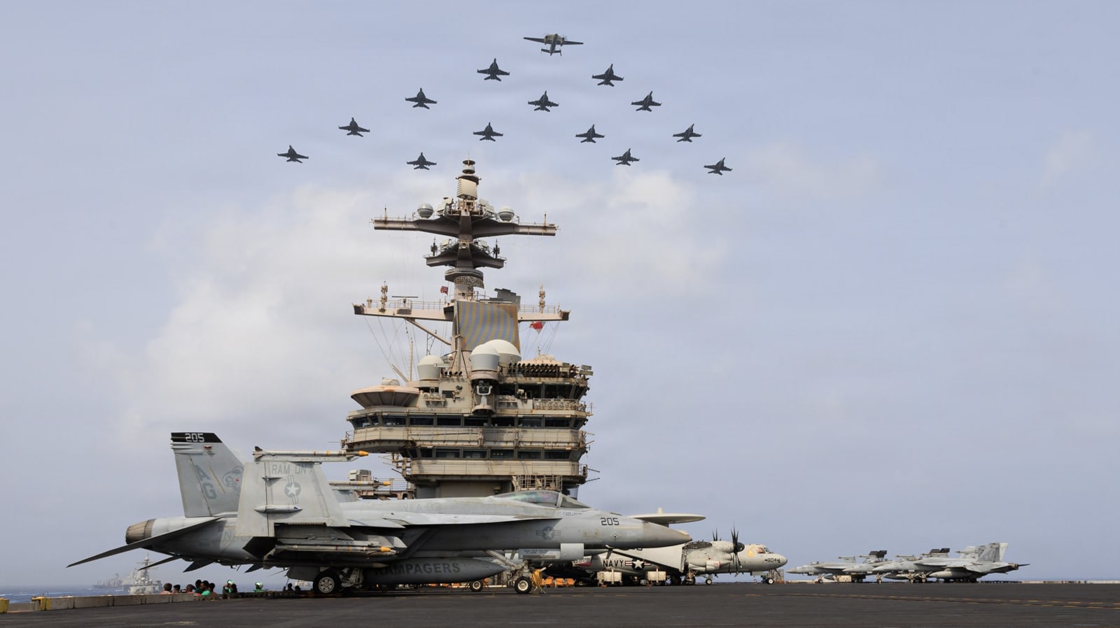 U.S. Navy aircraft and warships transit the Arabian Sea in close formation as CENTCOM forces continue to promote regional security and stability, June 30, 2026. (U.S. Navy photo)
