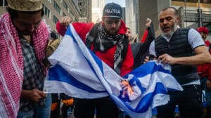 NEW YORK, UNITED STATES - May 15, 2021: Pro-Palestine, anti-Israel protesters hold a rally in New York City during fighting between Israel and Hamas in the Gaza Strip